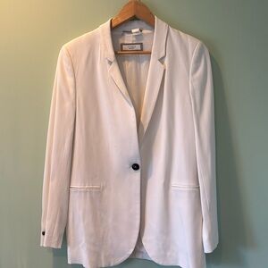 Women’s white blazer.